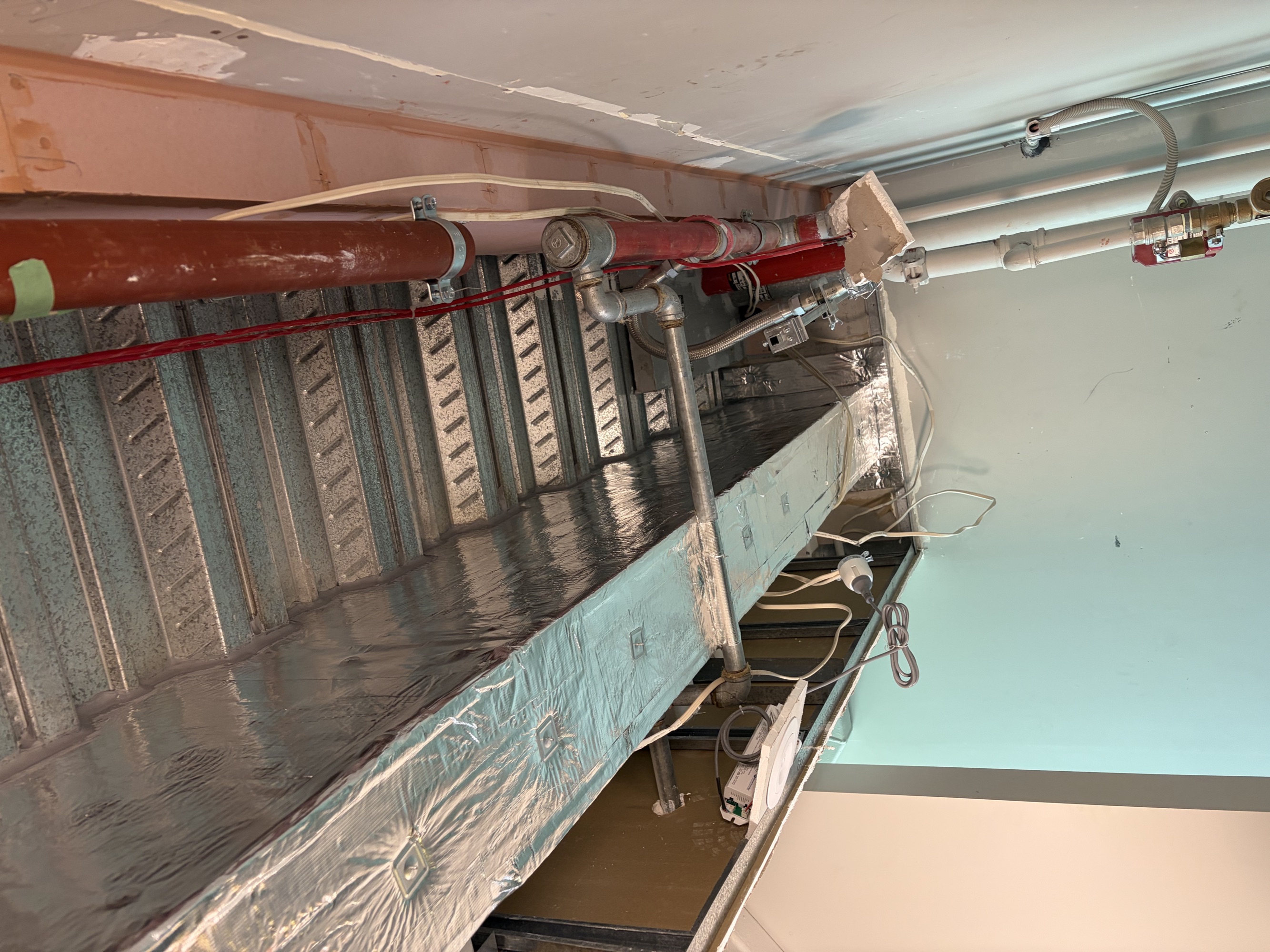 Structural steel beam wrapped and documented for sign-off